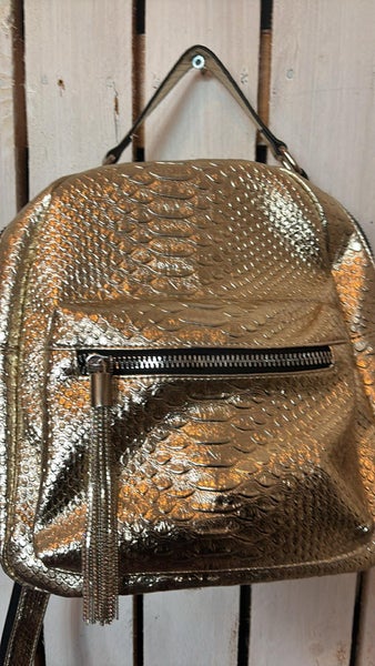 Reppu  Carina Ricci ,kulta